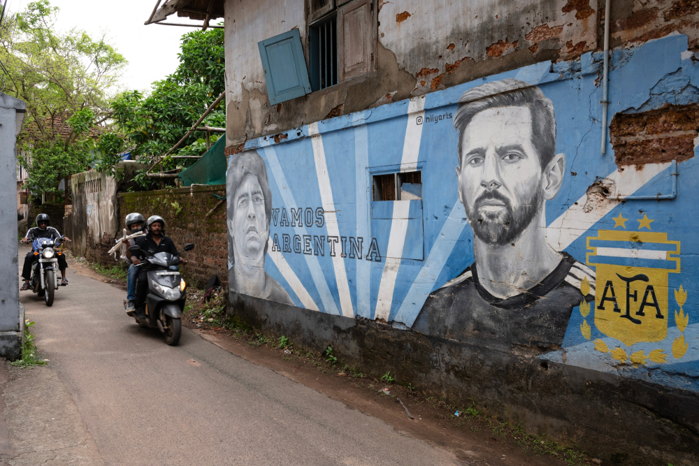 Graffiti featuring football players Diego Maradona and Lionel Messi on the streets of Kozhikode.    Photo by Joseph Rahul.