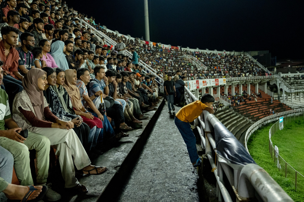 A diverse crowd enjoying the Calicut FC vs. Malappuram FC match. 