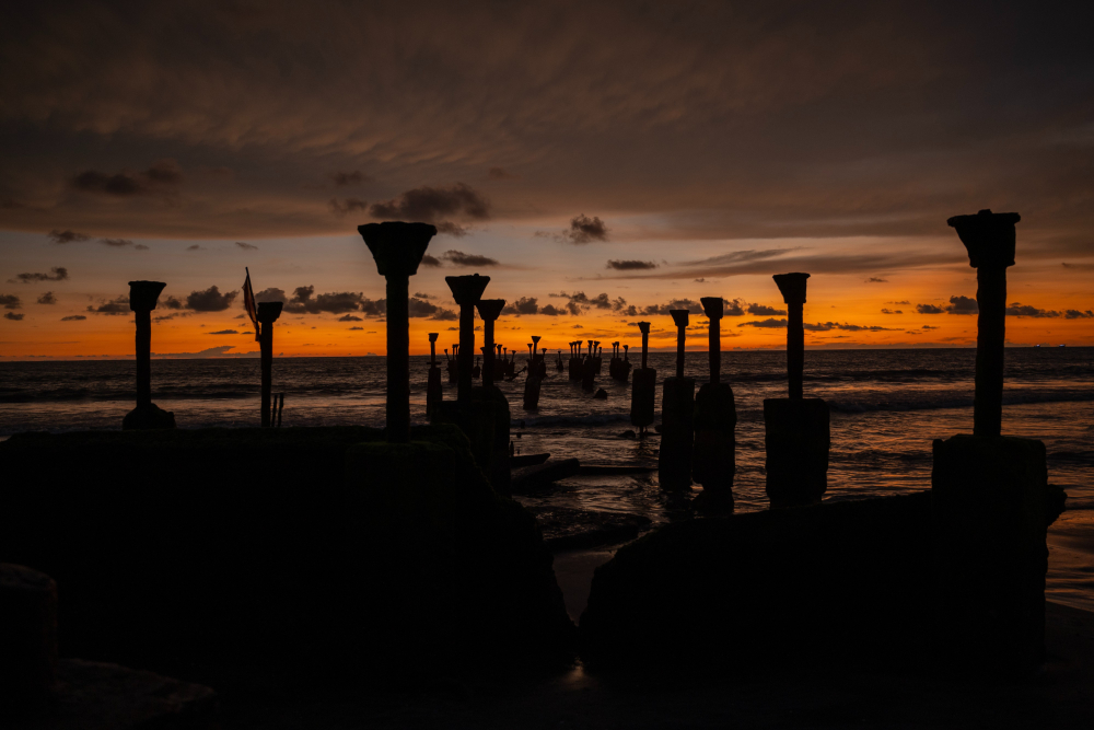 The historic piers of Kozhikode Beach.