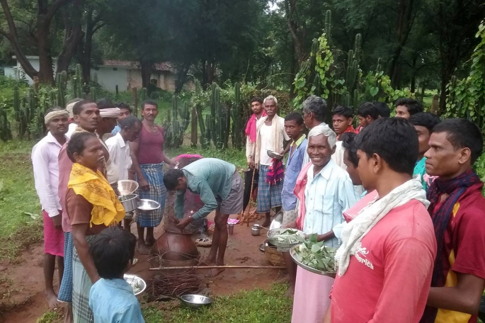 medicinal concocation are distributed and people also holding londi in the plates after Sahada deo are worshiped