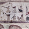 A mural in the Devi Kothi Temple in Chamba depicting a band of musicians. The mural is divided into various registers, with the musicians occupying the central one (Courtesy: Sarang Sharma)